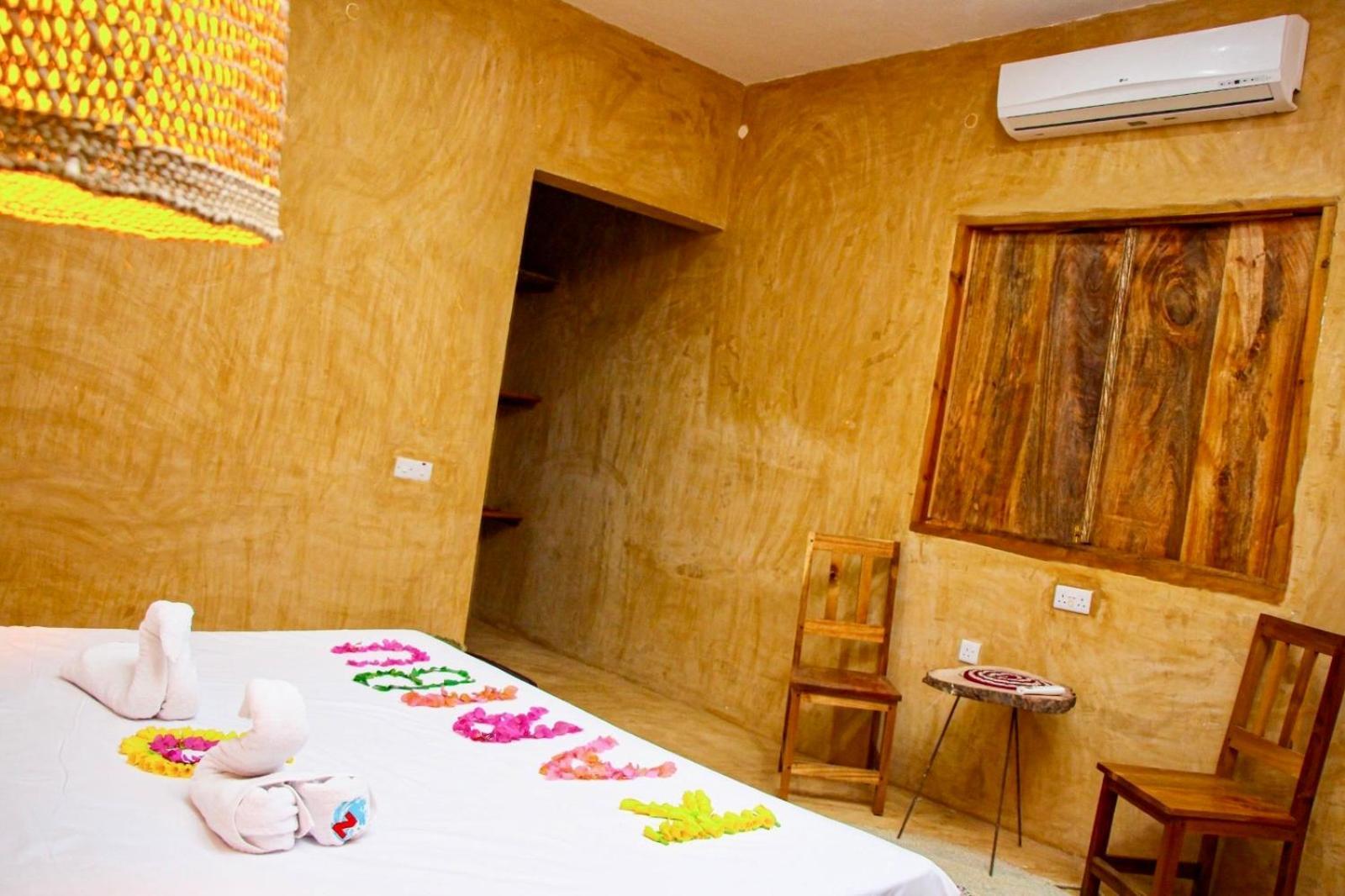 Zanzigo Hotel นูงวี ภายนอก รูปภาพ